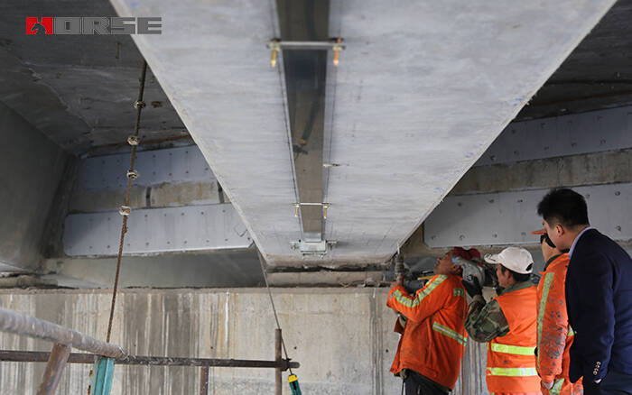 prestressed frp laminate for bridge strengthening