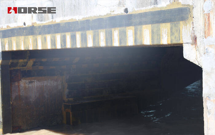 Carbon fiber wrap retrofit of reinforced concrete bridge 